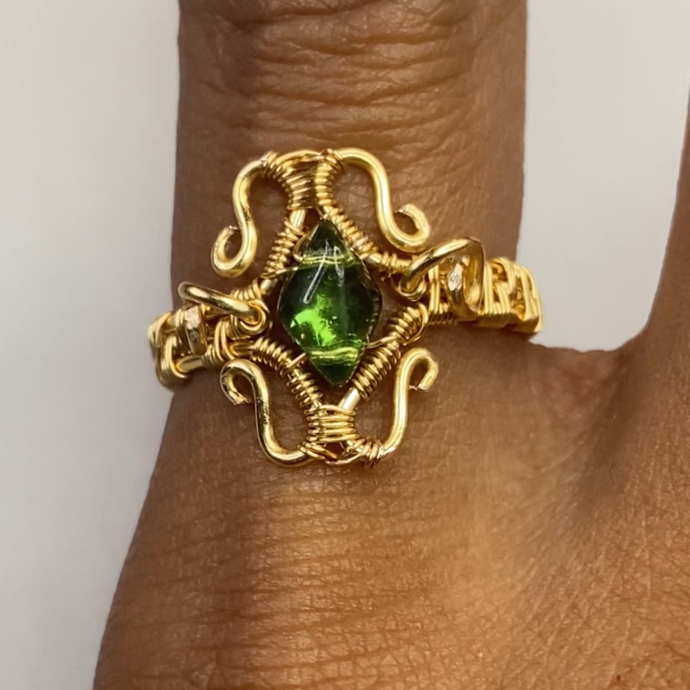 Vintage Gold and Green Gem Ring with Intricate Design